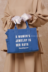 “A Women’s Jewelry Is Her Haya” Blue Cotton Tote Bag