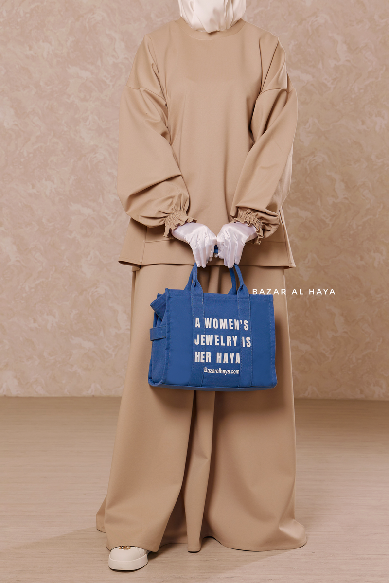 “A Women’s Jewelry Is Her Haya” Blue Cotton Tote Bag