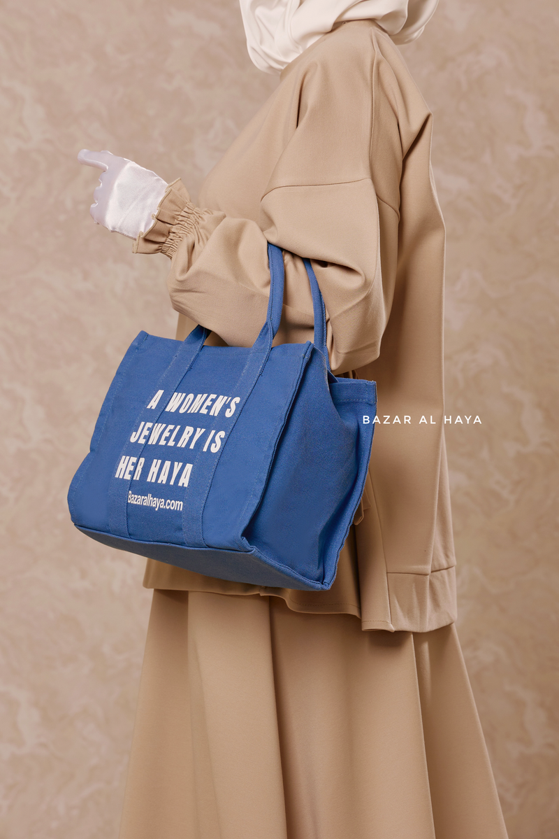 “A Women’s Jewelry Is Her Haya” Blue Cotton Tote Bag