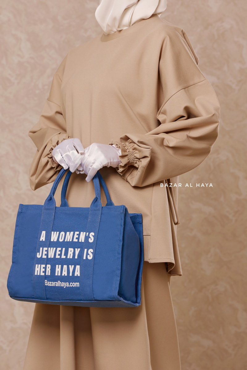 “A Women’s Jewelry Is Her Haya” Blue Cotton Tote Bag