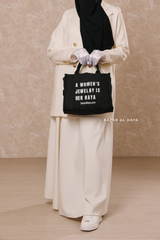 “A Women’s Jewelry Is Her Haya” Black Cotton Tote Bag