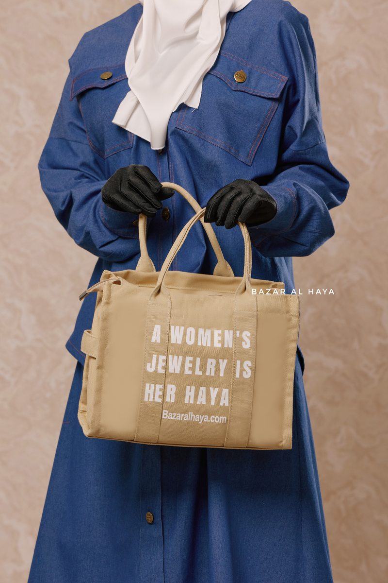 “A Women’s Jewelry Is Her Haya” Sand Cotton Tote Bag