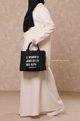 “A Women’s Jewelry Is Her Haya” Black Cotton Tote Bag