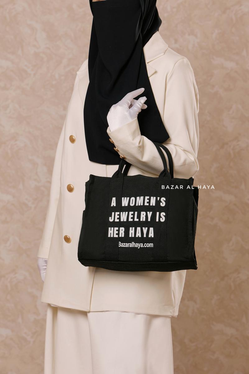 “A Women’s Jewelry Is Her Haya” Black Cotton Tote Bag