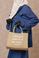 “A Women’s Jewelry Is Her Haya” Sand Cotton Tote Bag