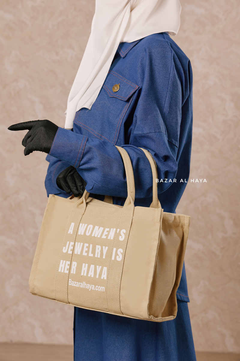 “A Women’s Jewelry Is Her Haya” Sand Cotton Tote Bag