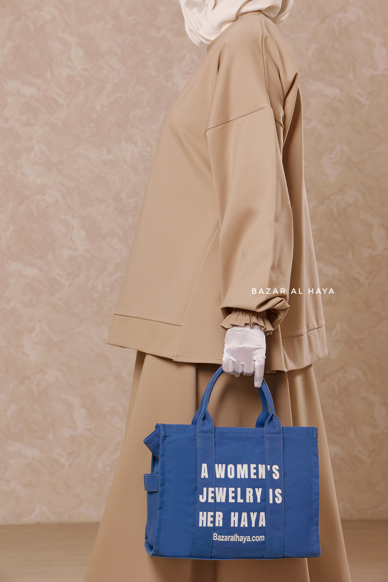 “A Women’s Jewelry Is Her Haya” Blue Cotton Tote Bag