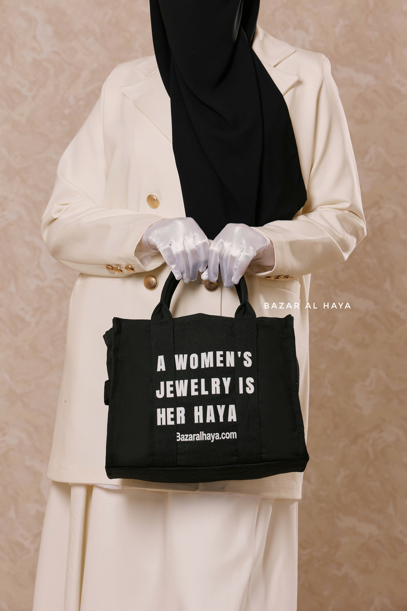 “A Women’s Jewelry Is Her Haya” Black Cotton Tote Bag