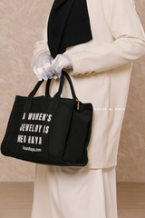 “A Women’s Jewelry Is Her Haya” Black Cotton Tote Bag